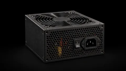 PC-Netzteil mit Lüftergitter und Netzanschluss